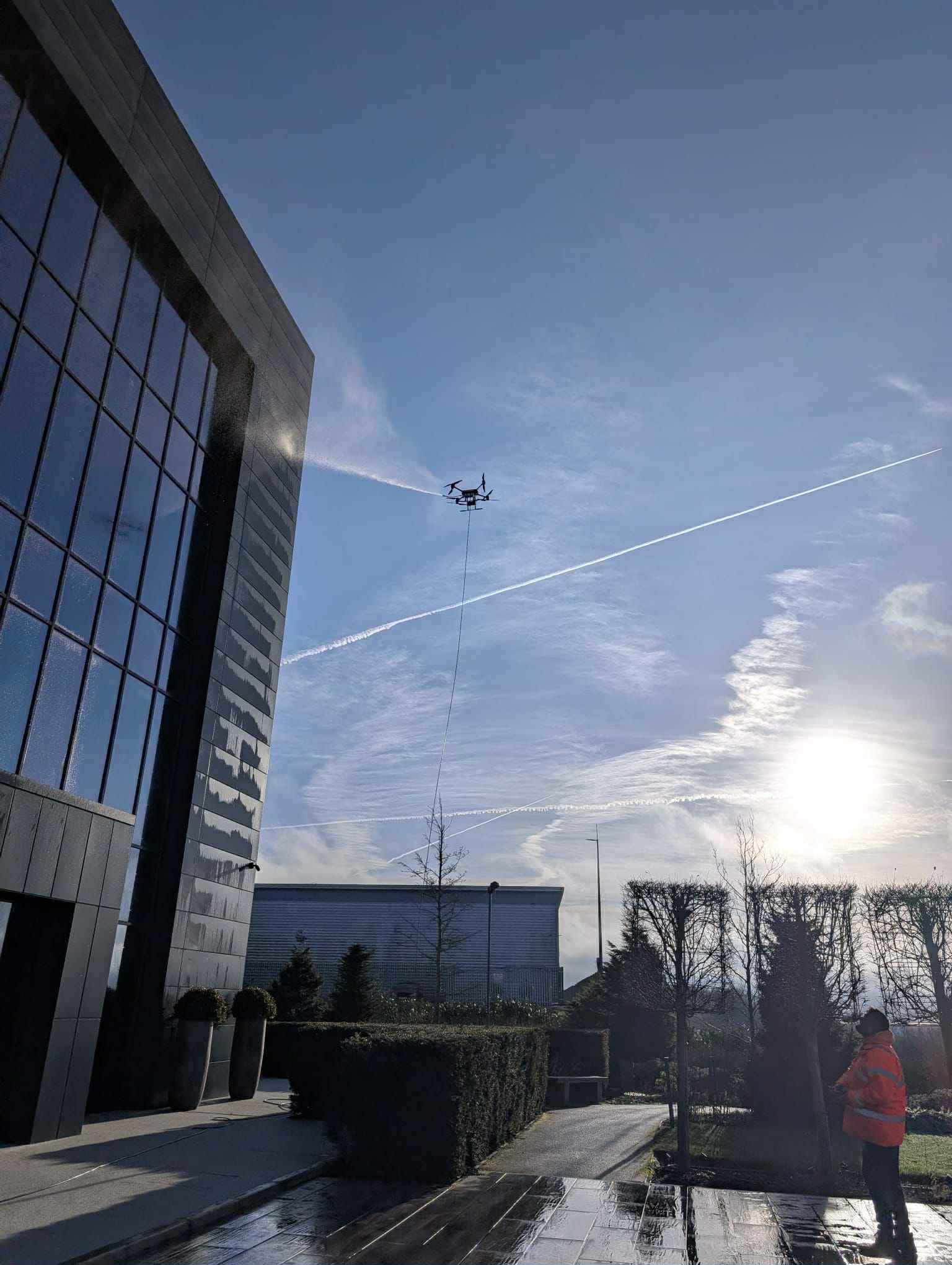 Drone cleaning building facade